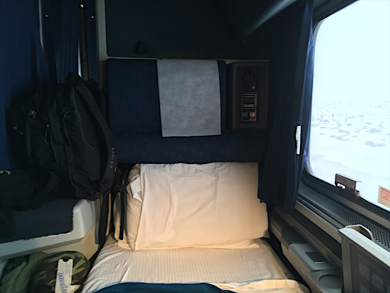 Amtrak sleeping car roomette.